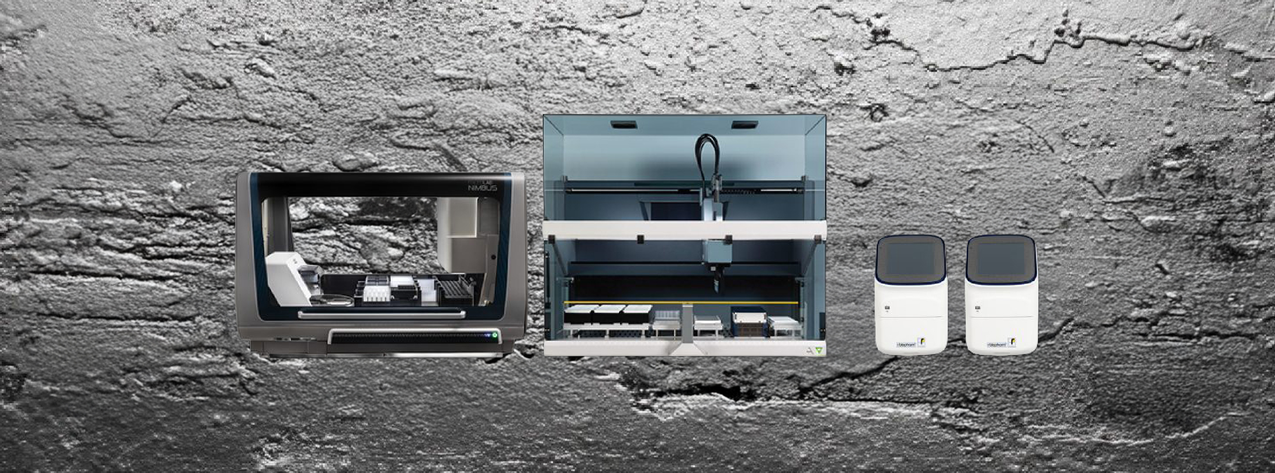 three machines of various sizes displayed on a grey background