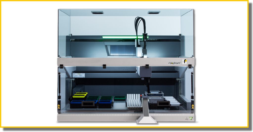 A large, complex piece of medical imaging technology with many components contained within a glass casing