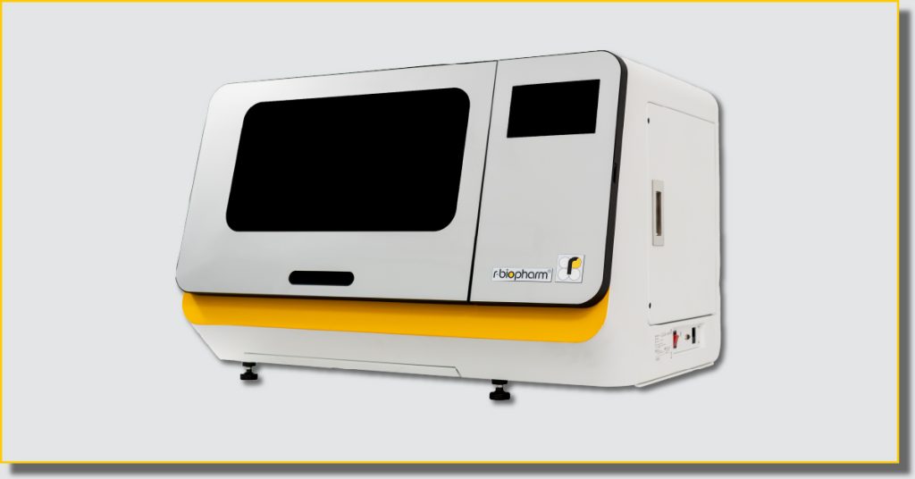 A white and yellow machine featuring a distinct yellow trim, designed for industrial or mechanical use.