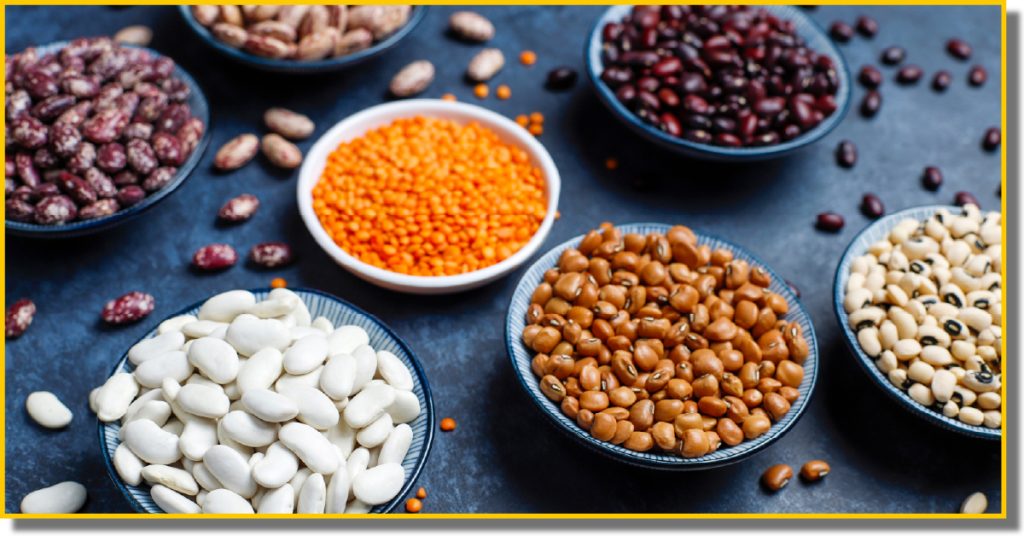 A variety of beans displayed in bowls