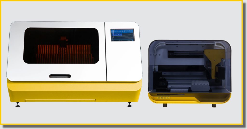 A yellow and white piece of diagnostic equipment featuring a white lid next to another yellow piece of equipment with a dark glass front